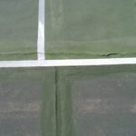 Large structural cracks on tennis court