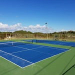 Tennis court installment